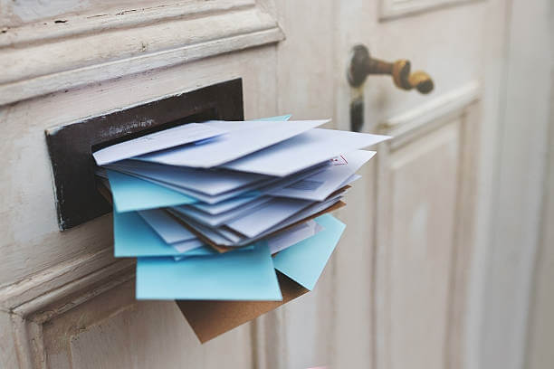 Picture of a stuffed letter box to illustrate an article about finding sales leads.