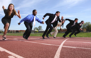A picture of salespeople in a race to illustrate our Sales Coaching Return on Investment article.