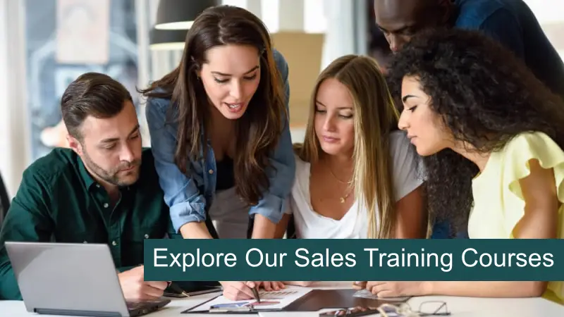 An image of people working together to support a page listing our UK sales training programmes.